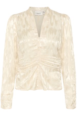 Cream-colored blouse with long sleeves, a deep V-neck, and gathered detailing at the waist. The fabric has a subtle, shiny texture.