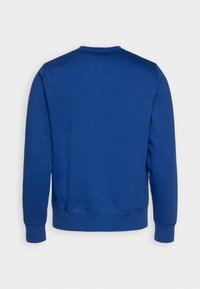 Felpa blu con colletto a girocollo, maniche lunghe, polsini e orlo a costine, realizzata in morbido cotone con una texture liscia.