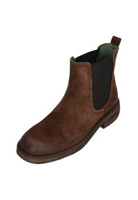 Braune Wildleder Chelsea-Stiefel mit elastischen Seitenpanelen, runder Spitze, niedrigem, gestapeltem Absatz und grünem Innenfutter.