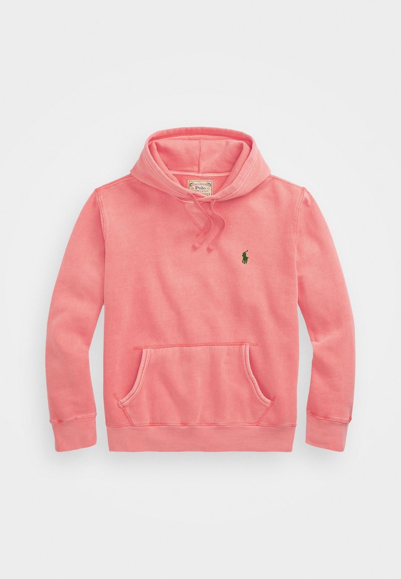Coral hoodie made of soft cotton. Features a front pocket, drawstring hood, and a small green logo on the chest. Smooth texture.