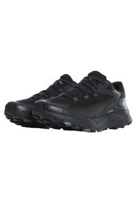 Black hiking shoes with a mesh surface, synthetic overlays, rugged rubber sole, and lacing system for secure fit. Features textured patterns.