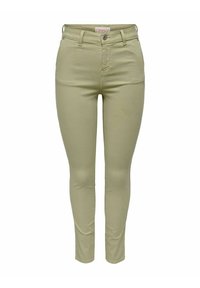 Světle olivově zelené skinny džíny s hladkou texturou, předními kapsami a knoflíkovým zapínáním. Obsahují klasický design s pěti kapsami.