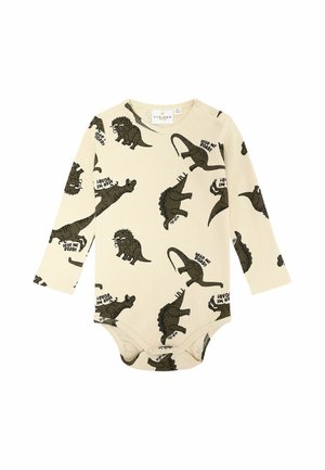 Krämfärgad bodysuit med långa ärmar och ribbat mönster, prydd med mörkgröna dinosaurieillustrationer och text. Inkluderar tryckknappar vid halsen och i botten.