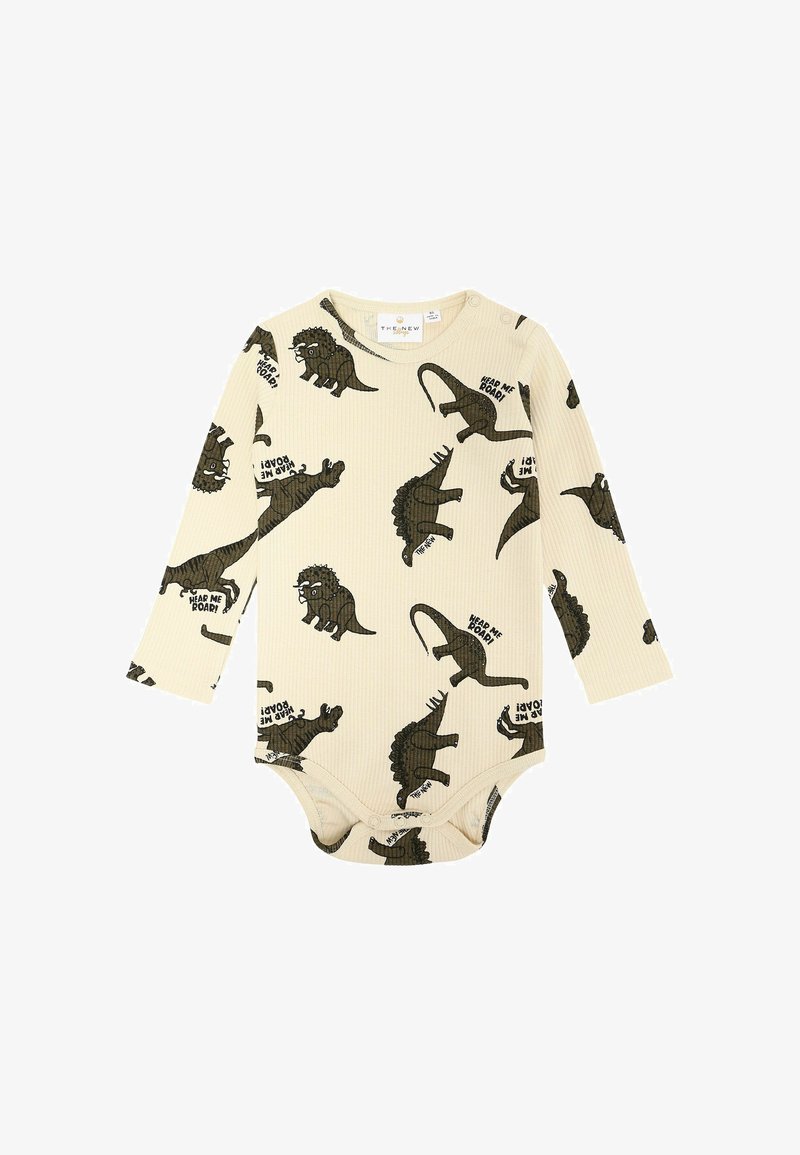 Krems krūšu piedurknēm bodijs ar ribotu tekstūru, kas rotāts ar tumši zaļu dinozauru ilustrāciju un tekstu. Ietver snap slēgšanu pie kakla un apakšā.