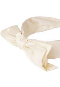 Satin hairband in cream color featuring a large bow at the front, smooth texture, and a wide, solid base for comfortable wear.