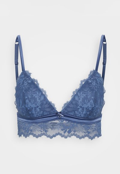Lace bralette in deep blue with triangular cups, scalloped lace edges, and a satin band. Features adjustable straps and a central decorative loop.