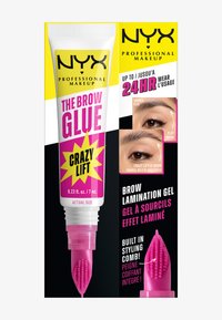 NYX Brow Glue, een 7 mL heldere gel in een witte en roze tube met een ingebouwde kam, heeft opvallende gele accenten en biedt 24-uur hold.