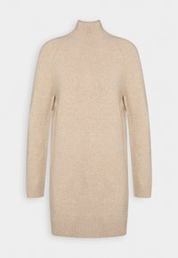 Maglione beige a maglia con colletto alto, maniche lunghe a raglan e polsini a coste. Tessuto morbido con una vestibilità leggermente comoda e aperture laterali.