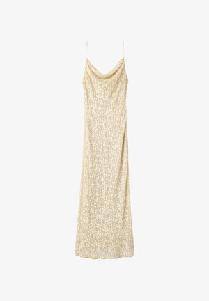 Beige maxi slipjurk met dunne spaghetti bandjes, watervalhals, subtiel wit abstract patroon en een split aan de zijkant.