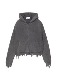 Grå cropped hoodie med ribbet tekstur, frontlynlås, to lommer og frynset kant. Har en rummelig hætte og løstsiddende ærmer.