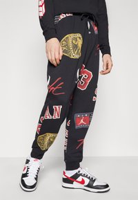 Jordan Pantalones deportivos - black/sail