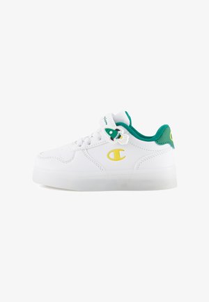 Witte sneaker gemaakt van synthetisch materiaal met een gestructureerd oppervlak, groene accenten op de hak en een unieke raketvormige charme aan de veters.