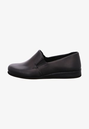 Black leather slip-on shoe with a smooth finish, rounded toe, minimal stitching details, and a low, flat rubber sole.