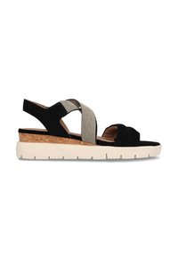 Schwarze Wildleder-Sandalen mit einem Kork-Blockabsatz, ausgestattet mit gekreuzten elastischen Riemen im Streifenmuster und einer strukturierten weißen Sohle.