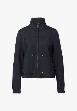 Giacca nera con zip, colletto alto, due tasche frontali e polsini elasticizzati. Tessuto morbido con un design aderente e senza motivi o decorazioni.