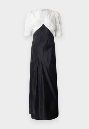 Robe longue avec un haut en satin blanc et une jupe en satin noir, dotée de manches bouffantes et d'un décolleté en V profond. Texture lisse, design élégant.