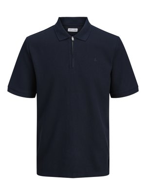 Marineblå polo skjorte med korte ærmer, struktureret stof, krave og en halvdækker. Har et lille logo på venstre bryst.