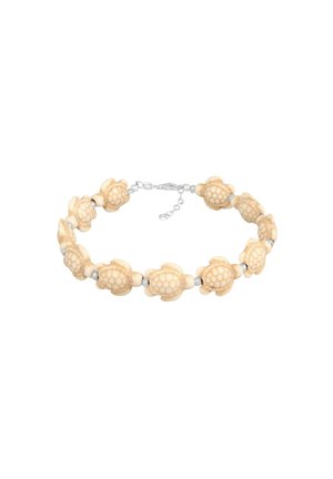 Armband mit beigen, schildkrötenförmigen Perlen, verbunden durch kleine silberne Abstandshalter und einen silbernen verstellbaren Verschluss.
