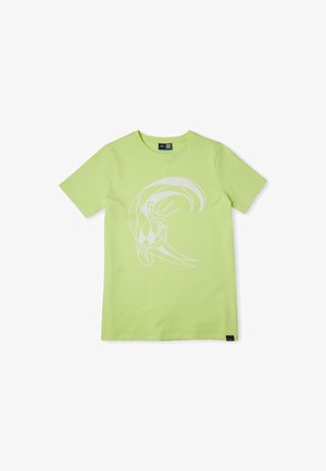 T-shirt vert clair à manches courtes avec col rond et motif abstrait blanc de surfeur sur le devant.