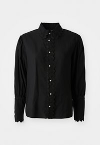Blusa negra de manga larga con cuello scalloped y placket de botones con acentos de perlas. Fabricada en un tejido ligero con un detalle texturizado.