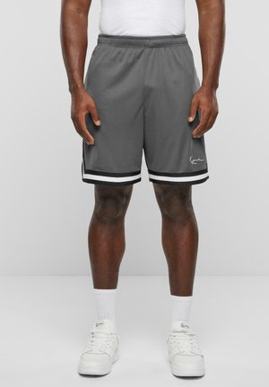 Gray athletic shorts with a drawstring waist, white and black accents on the hem, and a signature logo on the left leg.