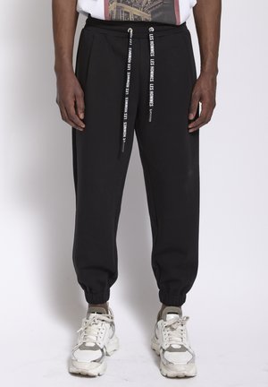 JOGGER - Trainingsbroek - black