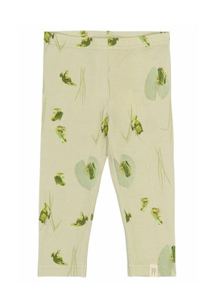 Rohelised retuusid, millel on konna ja ujuva lehe muster helesinisel taustal, valmistatud pehmest ja venivast kangast mugava vöökohtaga.