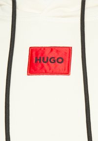 HUGO DARATSCHI - Sweatshirt com capuz - natural