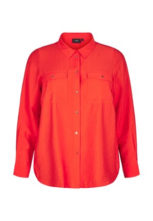 Red, long-sleeve shirt with a collar, two chest pockets, and button-down front. Made from lightweight, textured fabric.