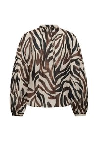 Blouse à manches longues avec imprimé zèbre marron, noir et beige, poignets froncés et petit pli au dos sous le col.