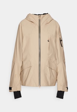 Beige outdoor jacket featuring a hood, zip front, multiple pockets, and black cuff accents. Made from lightweight, textured fabric.