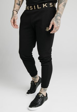PANT - Verryttelyhousut - black