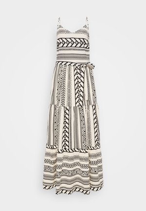 Rochie maxi în alb și negru cu modele geometrice, bretele ajustabile, corp strâns și fustă vaporoasă cu volane, dotată cu un cordon de legat.