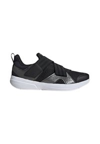 Chaussure de sport noire avec une tige en mesh, une sangle élastique et des accents moulés. Présente une semelle blanche et des éléments de design perforés pour la respirabilité.