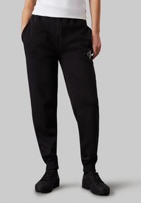Calvin Klein Jeans MONOLOGO CUFFED PANT - Treningo apatinė dalis - black
