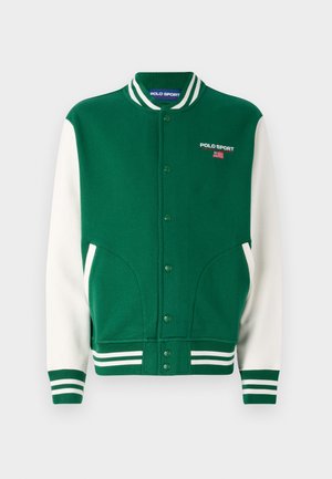 Grön bomullströja med jacka med vita ärmar, ribbade muddar och ränder. Har en knappstängning fram och "POLO SPORT"-logotyp på bröstet.