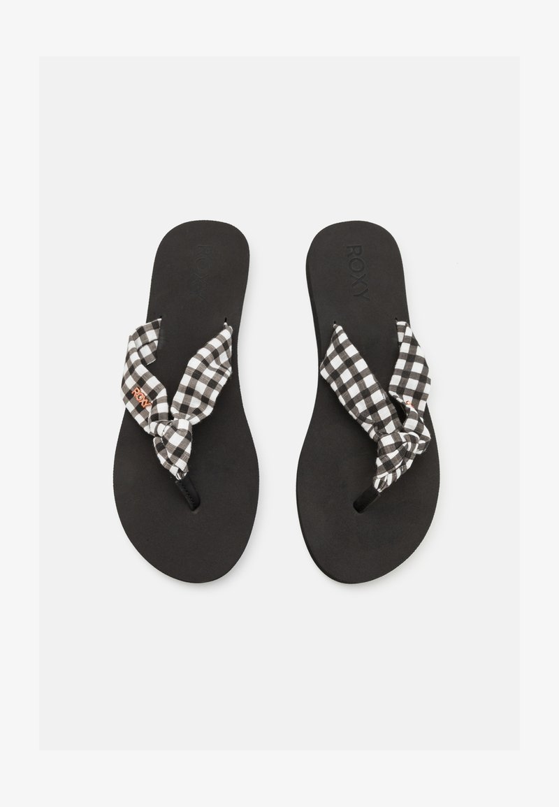 Black flip-flops with a knotted black and white gingham fabric strap, featuring a textured footbed and minimalistic design.