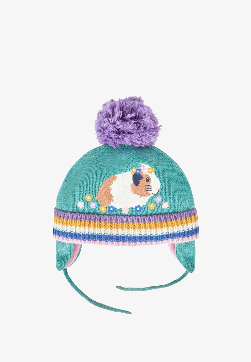 Šķiet, ka šis ir zils adīts cimds ar purpura pom-pomu, kam ir izšūts jūras cūciņas attēls un ziedu akcenti. Tam ir auss uzliku un daudzkrāsains svītrots apmalīte.