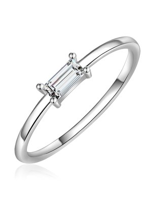 Silver ring with a slender band and a clear rectangular stone, secured by four prongs, featuring a smooth, polished surface.