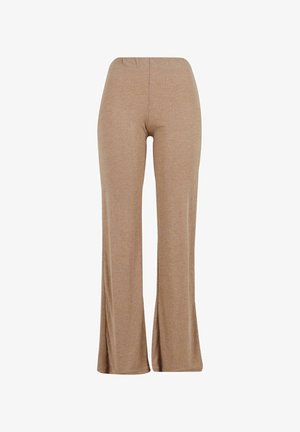 Bež hlače širokih nogavica s elastičnim pojasom, izrađene od mekog, teksturiranog materijala. Bez vidljivih džepova ili dodatnih ukrase.