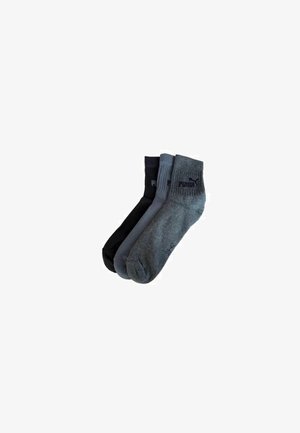 Three pairs of ankle socks in black, dark gray, and light gray. Made from a soft, stretchy material with ribbed cuffs and logo detail.