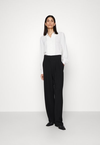 Iro JEON - Pantalon classique - black