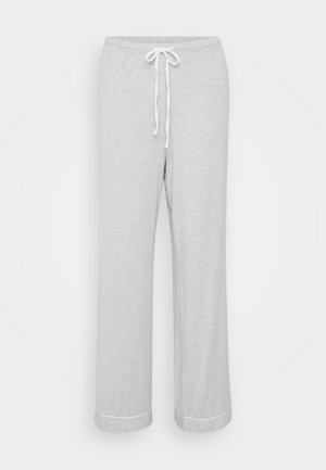 Ljusgrå sweatpants med elastisk midja, snörning och vita detaljer vid fållen. Tillverkade av mjukt, texturerat tyg.