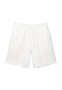 Shorts en coton blanc avec une taille élastique et un cordon de serrage, comportant deux poches latérales et un tissu texturé pour le confort.