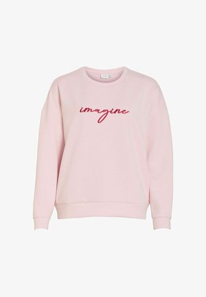 Lyserosa genser med rund hals, senkede skulder og ribbestrikkede mansjetter. Har rød brodert tekst "imagine" på forsiden.