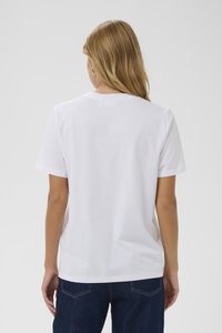 Weißes Baumwoll-T-Shirt mit kurzen Ärmeln, Rundhalsausschnitt und lockerer Passform. Sichtbare Nähte am Saum und an den Ärmeln.