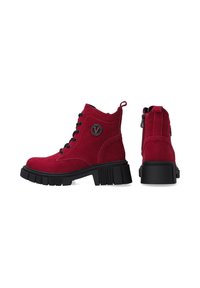Red suede ankle boots with black laces, a round logo detail, and a chunky black rubber sole. Features back zipper and pull tab.