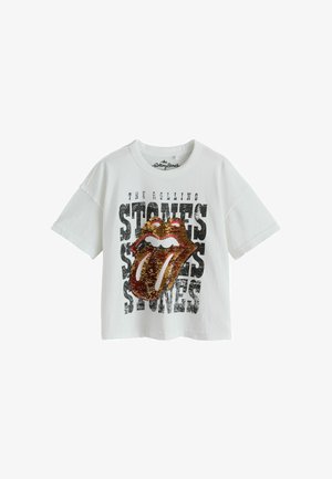 Hvid kortærmet T-shirt med The Rolling Stones-logo, der har en stor palietbesat rød mund og tunge over sort slidt tekst.