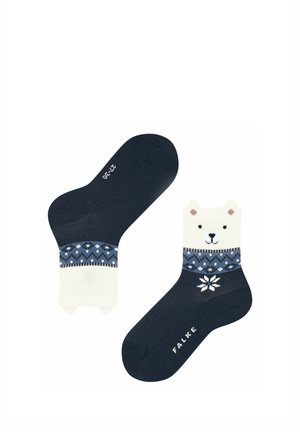Coppia di calzini alla caviglia blu navy con faccia di orso bianca e polsini decorati in blu e bianco, un calzino mostra la suola con taglia 27-29.