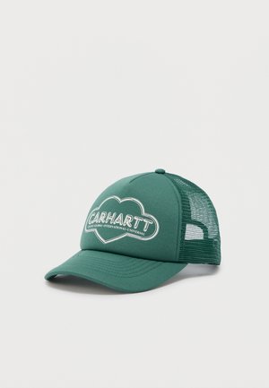 Green mesh trucker cap with curved brim and white outlined text "CARHARTT" inside a cloud shape on front panel.